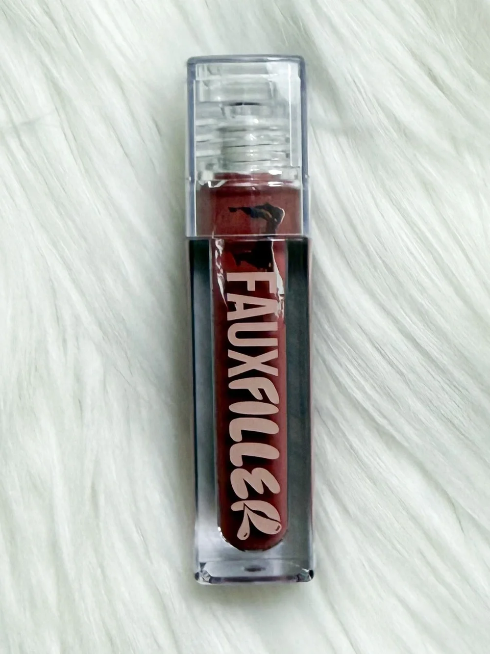 HUDA BEAUTY Faux Filter Lip Gloss “Bombshell”